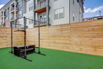 Community greenspace with fire pits and outdoor games